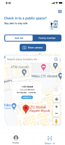 Check-in screen with a Just me / Family member toggle, a Show camera button, and a live map pinning the LTC Glodok venue